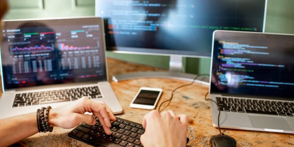 Programmer working with program code
